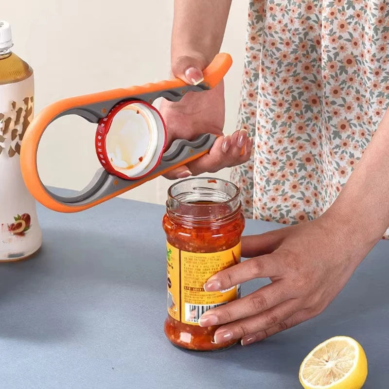 Multifunctional 4-in-1 Kitchen Tool Jar Gripper Lid Opener, Can Opener, Bottle Opener -